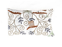 Unique suzani pillowcase 30x50 cm with white base and colorful sling patterns in blue green and brown, ethnic oriental boho vintage style.